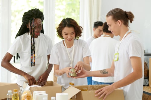 Preview: Friends Working as Volunteers in Charity Organization
