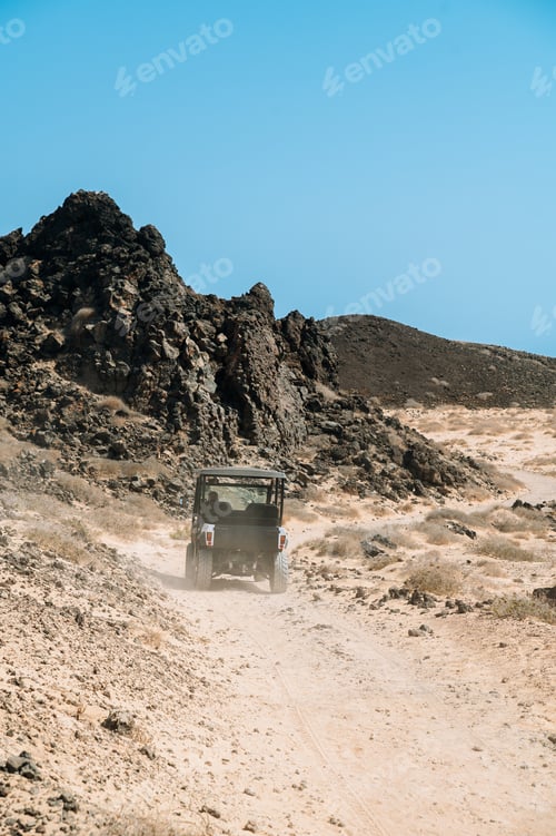 Preview: Traveler riding buggy car on beach