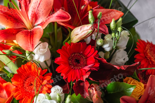 Preview: Vibrant Bouquet of orange Asiatic lilies and other flowers
