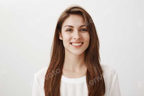 Preview: Girl is happy receive good feedback about her site. Portrait of attractive caucasian woman in white