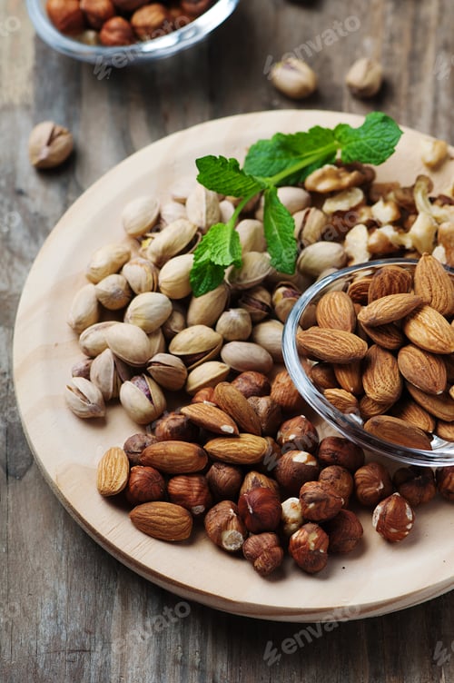 Preview: Mix of nuts on the wooden table