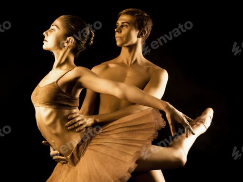 Preview: Professional, emotional ballet dancers on dark scene performed by sexual couple with golden body art