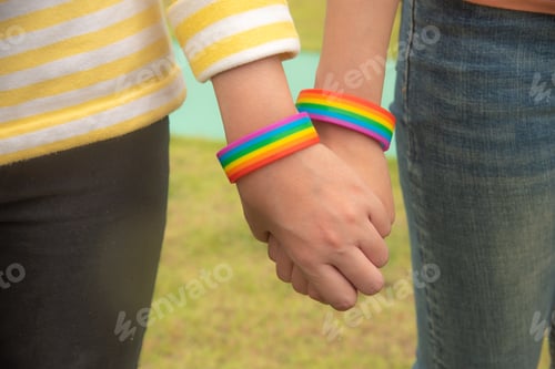 Preview: Diversity people hands together and wear Rocket Wristband.