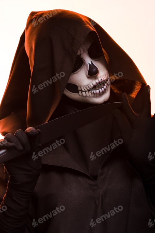 Preview: woman with skull makeup holding knife isolated on white