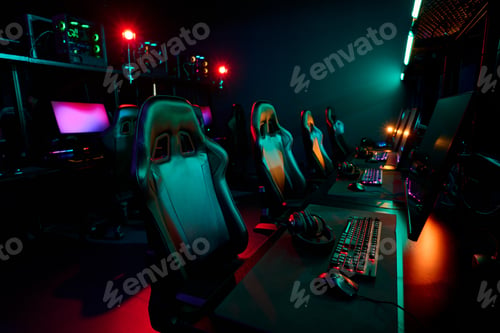 Preview: Empty Gaming Chairs Awaiting Teenage Girls Esports Team in Neon Lit Arena
