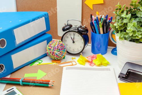 Preview: Work place of a creative person with a variety of colorful stationery objects