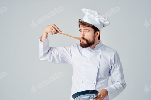Vorschau: ein Mann in einer Kochuniform, Pfanne, Kochküche, Professionell
