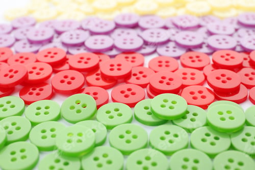 Preview: Many colorful plastic sewing buttons as background, closeup