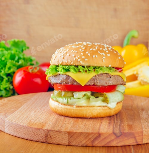 Preview: Juicy hamburger with fresh ingredients served on a wooden board in a vibrant kitchen setting filled