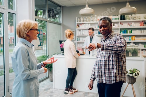 Preview: Portrait of a senior african american man patient in a pharmacy
