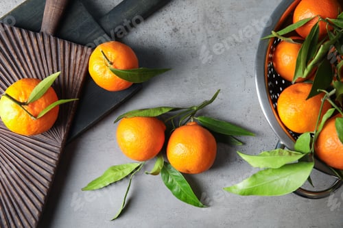 Preview: Flat lay composition with ripe tangerines on grey background