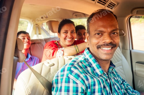Preview: happy indian family together going to vacation on beach in Goa