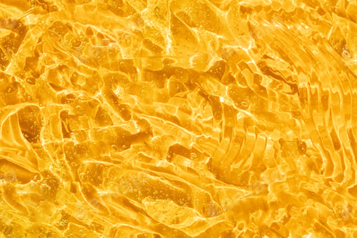 Preview: Serum texture, clear gel bubbles on yellow background. Skincare lotion face product swatch