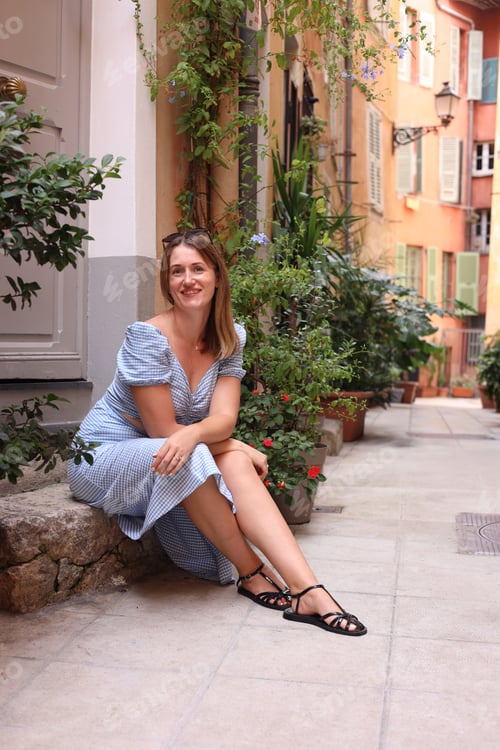 Preview: Portrait of beautiful woman on city street