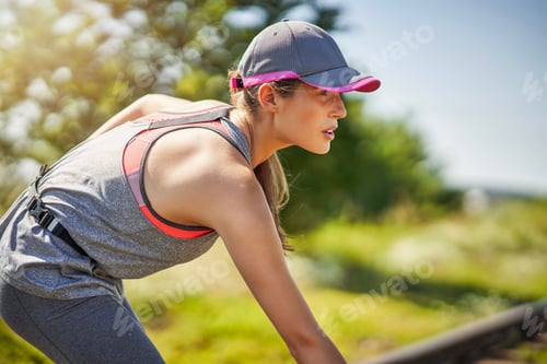 Preview: Female jogger running in the countryside