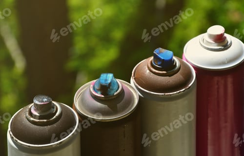 Preview: A few used aerosol paint sprayers lie on the windowsill in the workshop of a graffiti artist