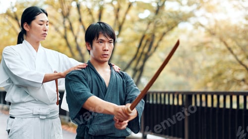 Preview: Martial arts, man and master class with wood sword with fight, battle and samurai training. Park, u