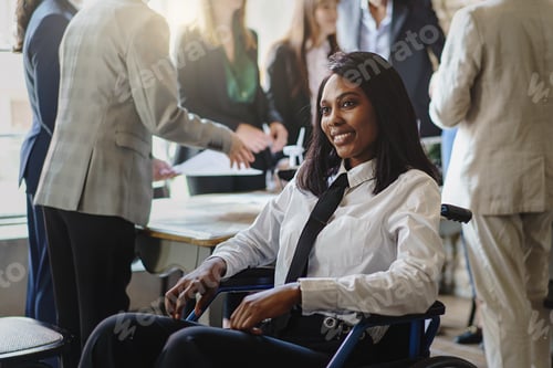 Preview: Portrait of a young African American businesswoman in a wheelchair