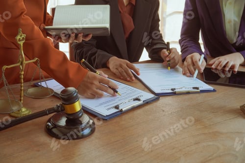 Preview: A group of lawyers and clients engage in a professional meeting law office, discussing agreements