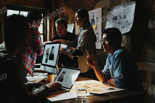 Preview: Group of creative people working and brainstorming together