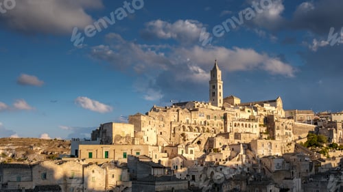 Preview: Breathtaking sunset illuminates the ancient stone city of Matera, Puglia with historical charm