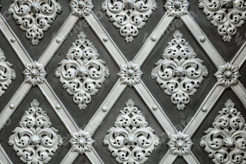 Preview: Seamless grey decorative forged overlays door gate texture in Prague. Incredible stucco
