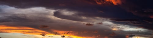 Preview: Dramatic Panoramic View of a cloudscape during a dark and colorful sunset
