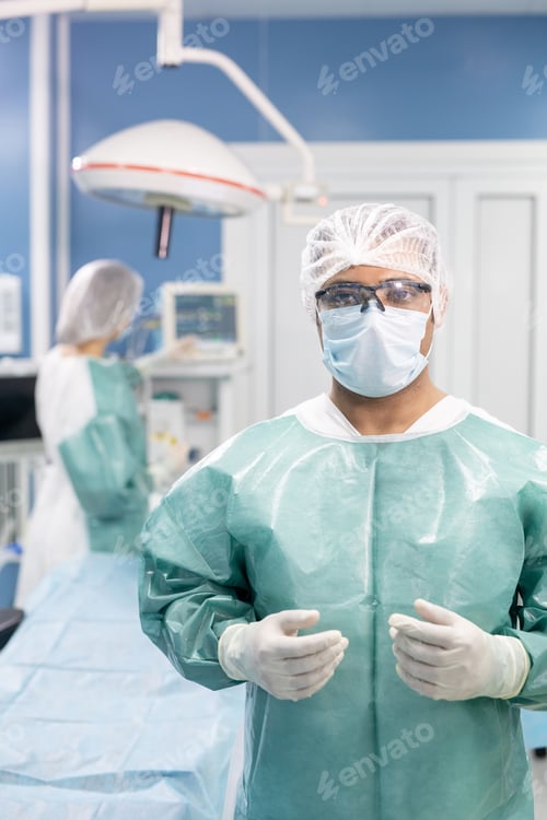 Preview: Surgeon in Operating Room Wearing Protective Gear
