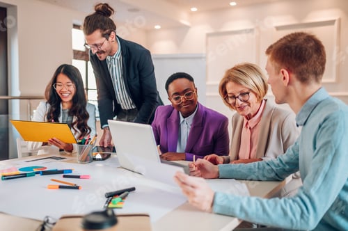 Preview: Multiracial business group of people having a meeting in an office