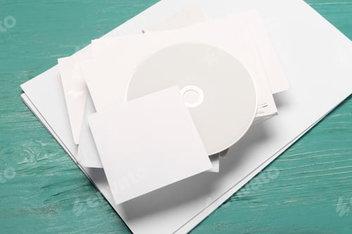 Preview: CD disk on wooden table