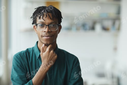 Preview: African young designer at office