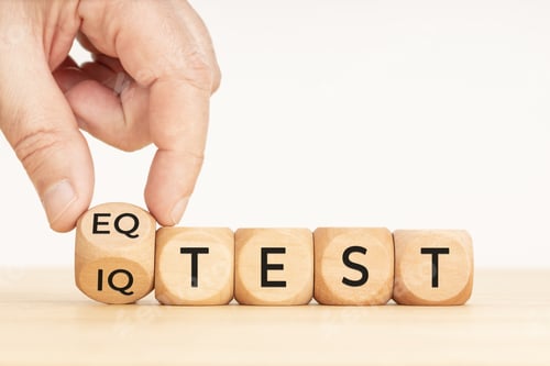 Preview: Hand flipping a wooden block with eq test and iq test phase
