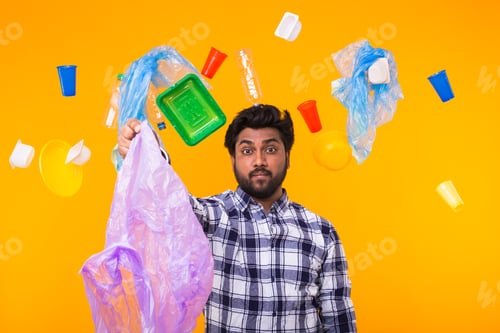 Preview: Environmental pollution, plastic recycling problem and waste disposal concept - surprised indian man