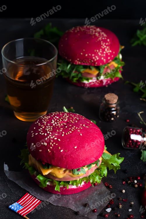 Preview: two tasty hamburgers with little American flags