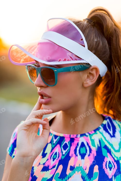 Preview: Close up portrait slim girl in stylish colorful crop top.