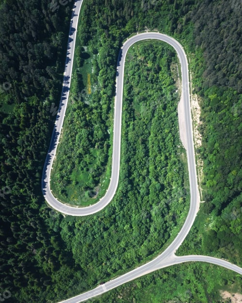 Preview: Flight over the summer mountains with mountain road serpentine