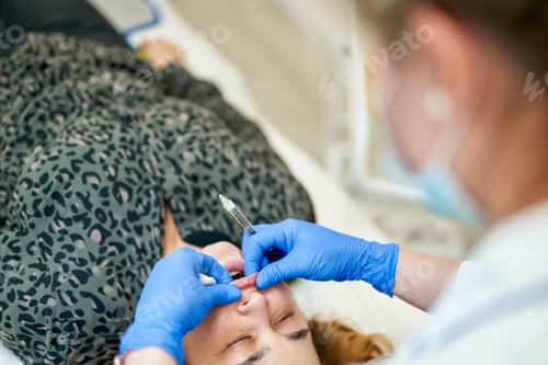 Preview: The Doctor Cosmetologist Makes Lip Augmentation Procedure Of A Beautiful Woman In A Beauty