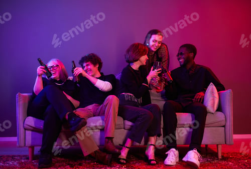 Preview: Young People at Party in Neon Light