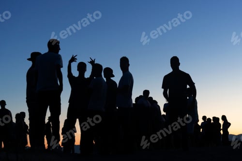 Preview: Gen Z silhouetted outdoor party