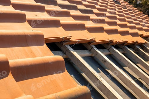 Preview: Overlapping rows of yellow ceramic roofing tiles mounted on wooden boards