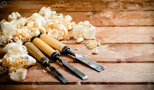 Preview: Chisel with a bunch of wood sawdust.