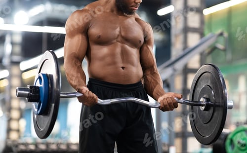 Preview: Cropped of black muscular guy bodybuilder lifting weights