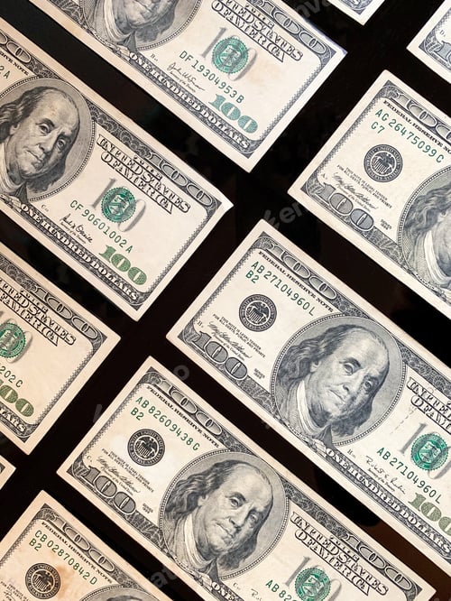 Preview: Crisp Hundred Dollar Bills Background on Black Surface