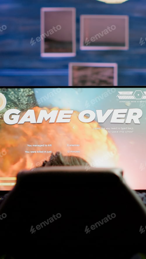 Preview: Upset professional woman gamer wearing headset losing space shooter game