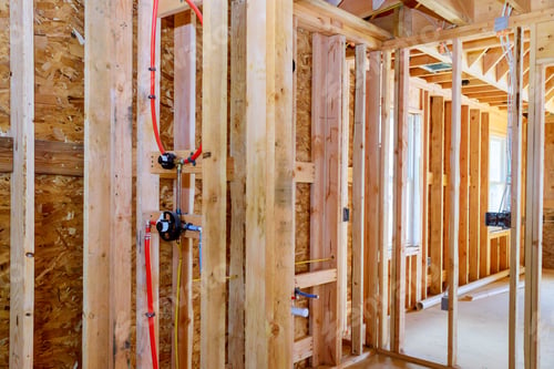 Preview: Home construction with hot red and cold blue pex pipe layout in pipes and exposed beams