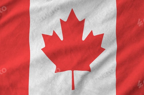 Preview: Canada flag depicted on folded wavy fabric of old cloth