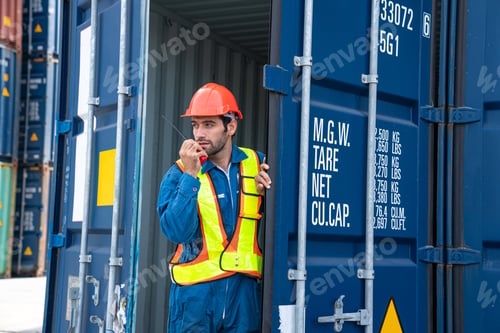 Preview: Male Container yard worker control and checking container.