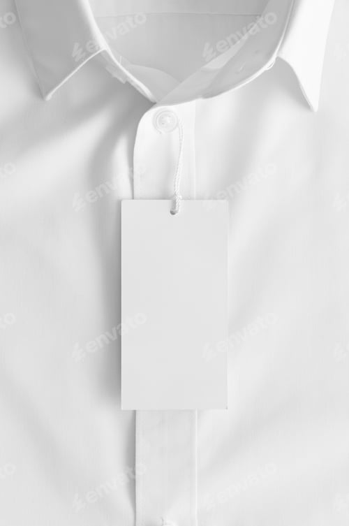 Preview: White clothing tag mockup on a white shirt.