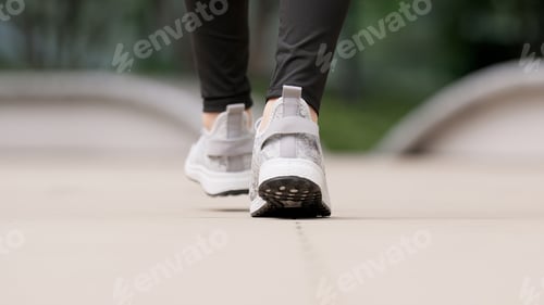 Preview: Feet of a walking woman