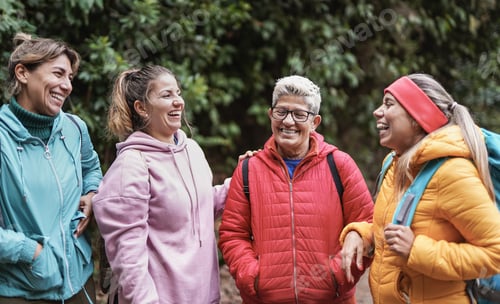 Preview: Multi generational women having fun outdoor during trekking day